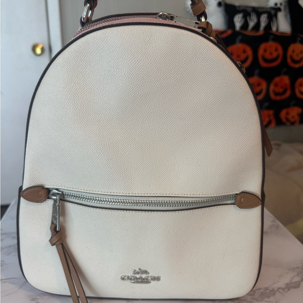 Coach cream, tan and pink back pack and matching wristlet wallet